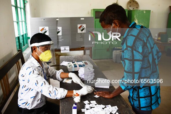 A voter's finger is inked while casting their ballot during first  phase polling  for Assam Assembly Elections, at Rupohi   constituency  in... by Anuwar Hazarika/NurPhoto