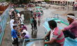 An Indian muslims devotees  perform ' Wazoo' before offer prayer ' Namaz' on the second Fr...