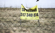 An advertisement for a plot of land is seen with a phone number in Warsaw, Poland on March...