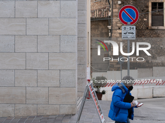 A man walking around L'Aquila on March 25, 2021. The 12th anniversary of the L'Aquila earthquake will be marked on 06 April 2021, commemorat...