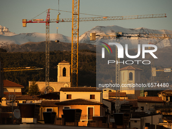 A view of buildings and tower cranes in L'Aquila on March 25, 2021. The 12th anniversary of the L'Aquila earthquake will be marked on 06 Apr...