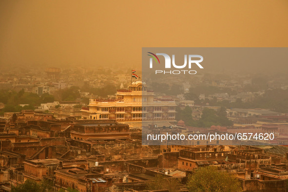 View of a city neighbourhood in Jaipur, Rajasthan, India, on March 30, 2021  is seen shrouded in haze, during a cloudy and dusty weather. 