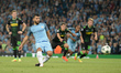 Sergio Aguero makes it 2-0 to City with a penalty during the UEFA Champions League match b...