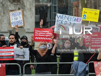 LONDON, UNITED KINGDOM - MARCH 31, 2021: Protesters demonstrate in Parliament Square against the military coup and killing of civilians duri...