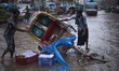 DHAKA, BANGLADESH  27th June : Passangers and the rickshaw-puller struggling to get out fr...