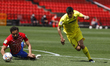 Gerard Moreno, of Villarreal CF and German Sanchez, of Granada CF during the La Liga match...