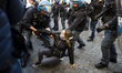  Anti-riot police officers confront protesters during a demonstration of restaurant owners...