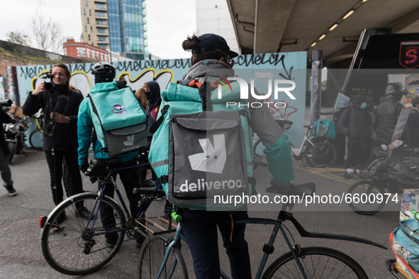 LONDON, UNITED KINGDOM - APRIL 07, 2021: Deliveroo riders stage a strike action over pay, rights and working conditions outside Shoreditch H...