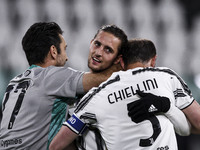 Juventus goalkeeper Gianluigi Buffon (77), Juventus midfielder Adrien Rabiot (25) and Juventus defender Giorgio Chiellini (3) celebrate vict...