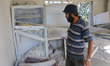 Home owner inspects the remains of his belongings that were destroyed by bombing
Targetin...