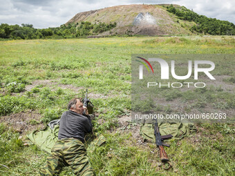 Soldier shooting during a military training of the DPR army in the outskirts of Donetsk city on June 29, 2015. (