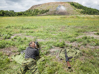 Soldier shooting during a military training of the DPR army in the outskirts of Donetsk city on June 29, 2015. (