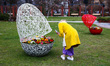 Easter eggs decorations with spring flowers are seen at Doncaster Square in Gliwice, Polan...
