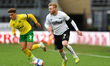 Kamil Jozwiak of Derby County looks up for options during the Sky Bet Championship match b...