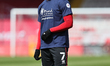  Tayo Edun of Lincoln City warms up ahead of the Sky Bet League 1 match between Lincoln Ci...
