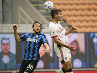 Andrea Carboni (R) of Cagliari Calcio competes for the ball with Matteo Darmian (L) of FC Internazionale during the Serie A match between FC...