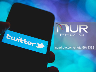 In this photo illustration Twitter logo is displayed on a smartphone screen in Athens, Greece on April 14, 2021. (