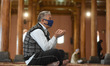 A Kashmiri man prays on the first day of Ramadan in Kashmir's grand mosque in Srinagar, In...