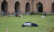 A Kashmiri man rests inside Kashmir's grand Mosque Jamia Masjid on the first day of Ramada...