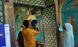 Kashmiri people seek blessings inside a shrine in Old City Srinagar, Indian Administered K...