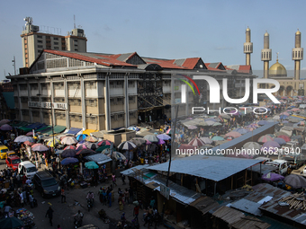 A picture shows a view of the Lagos Central Mosque and busy business activates on the second day of holy month of Ramadan at the Lagos Centr...