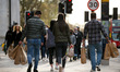 Shoppers carry bags along a busy Oxford Street in London, England, on April 17, 2021. Acro...