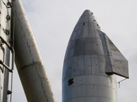 Starship SN15 seen behind Starhopper at SpaceX's South Texas Launch Site in Boca Chica, Texas on April 19th, 2021.  (