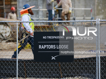 A sign reads "No Trespassing, Raptors Loose" referring to the Raptor engines which propel the Starship. April 19th, 2021 Boca Chica, Texas....