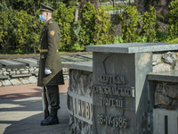 Soldier guards the memorial site about the Chernobyl catastrophe during the celebrations in Kiev, Ukraine, on April 26, 2021 of the 35th ann...