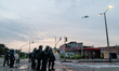 A general view of police officers, riot police ESMAD and the police helicopter as clashes...