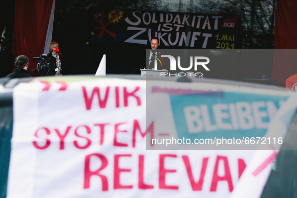 Duesseldorf mayor Dr. Stephan Keller is seen speaks to in the drive in labor day rally in Duesseldorf, Germany on May 1, 2021 