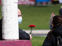 A man holds a red carnations during the International Worker's Day, on May 1, in Lisbon, Portugal.
International Worker's Day brings togeth...