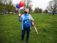 A woman celebrates 17-year of Polish membership in the European Union. Krakow, Poland on May 1st, 2021. Despite of the coronavirus pandemic...