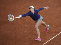 Iga Swiatek of Poland in action during her match against Ashleigh Barty of Australia at La Caja Magica on May 03, 2021 in Madrid, Spain. (