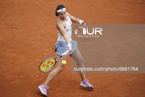 Latvia's Anastasija Sevastova in action to Spain's Paula Badosa during their 2021 WTA Tour Madrid Open tennis tournament singles match at th...