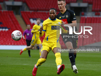 L-R Lamar Reynolds of Concord Rangers holds of Will Smith of Harrogate Town during  The 2019/2020 Buildbase FA Trophy Final between Concord...