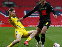 L-R Lewis Simper of Concord Rangers (on loan from Cambridge United) and Darren Lough of Hebburn Town  during  The 2019/2020 Buildbase FA Tro...