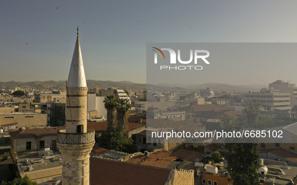 The minaret of the Grand Mosque of Limassol with city views. Limassol, Cyprus, Wednesday, May 5, 2021. The Kebir Mosque, located in the old...