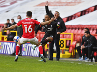  Cohen Bramall of Lincoln City battles for possession with Adam Matthews of Charlton Athletic during the Sky Bet League 1 match between Char...