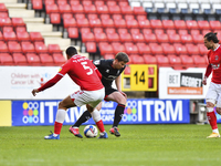  James Jones of Lincoln City battles for possession with Akin Famewo of Charlton Athletic during the Sky Bet League 1 match between Charlton...