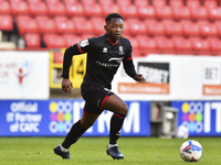  Tayo Edun of Lincoln City in action during the Sky Bet League 1 match between Charlton Athletic and Lincoln City at The Valley, London on T...