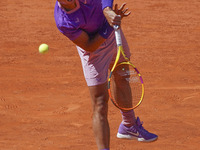 Rafael Nadal of Spain in action during his second round match against Carlos Alcaraz of Spain during day seven of the Mutua Madrid Open at L...