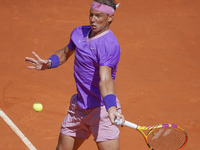 Rafael Nadal of Spain in action during his second round match against Carlos Alcaraz of Spain during day seven of the Mutua Madrid Open at L...