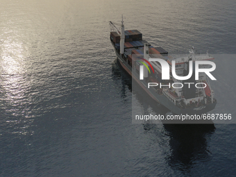 Top view of the cargo ship, which is moored near the Mediterranean port of Limassol. Cyprus, Thursday, May 6, 2021. (