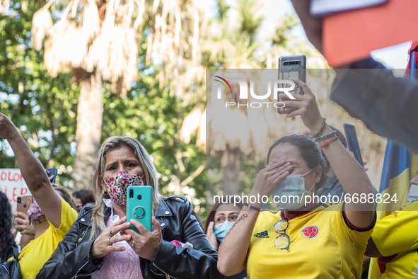 Protester is seen crying
About 400 people, mostly from the Colombian community of Barcelona, have demonstrated one more day in support of th...