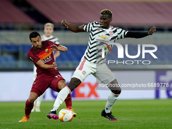 Pedro of AS Roma and Paul Pogba of Manchester United compete for the ball during the UEFA Europa League Semi-Final match between AS Roma and...