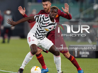 Paul Pogba of Manchester United and Lorenzo Pellegrini of AS Roma compete for the ball during the UEFA Europa League Semi-Final match betwee...
