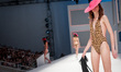 A model showcases a clothes of 'Swimwear over the rainbow'', a new collection Spring - Sum...