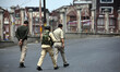  Indian policemen walks in old city as Corona curfew continues across the Kashmir valley o...