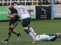  Adam Radwan of Newcastle Falcons is challenghed by Albert Tuisue of London Irish during the Gallagher Premiership match between Newcastle F...
